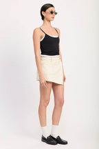 ASYMMETRICAL FOLD over DENIM SKORT