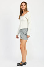 MINI SKIRT with DIAGONAL BUTTON DETAIL